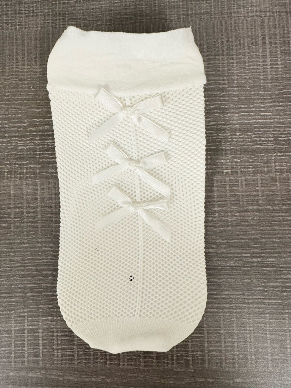 2 pair of Anthropologie fishnet Socks with Satin Bow Accents